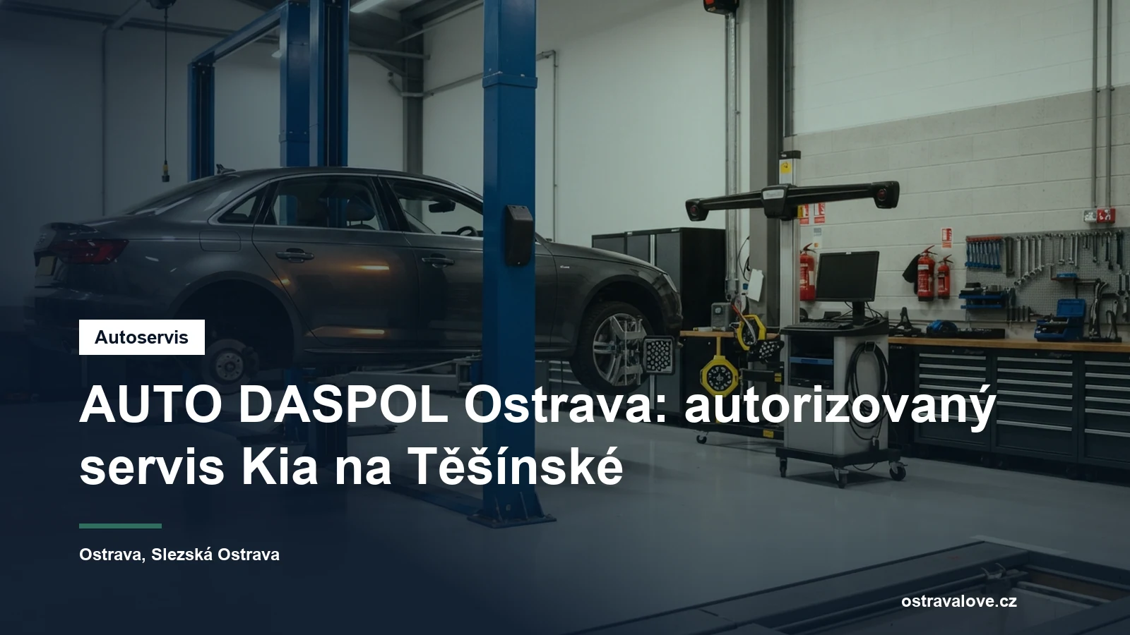Servisní hala autorizovaného autoservisu v Ostravě, osobní vůz na zvedáku a vedle něj diagnostický vozík s přístrojem
