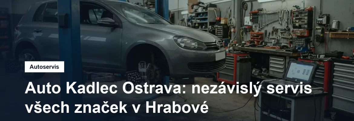Dílna nezávislého autoservisu v Ostravě, osobní vůz na zvedáku a vedle něj pojízdný diagnostický přístroj