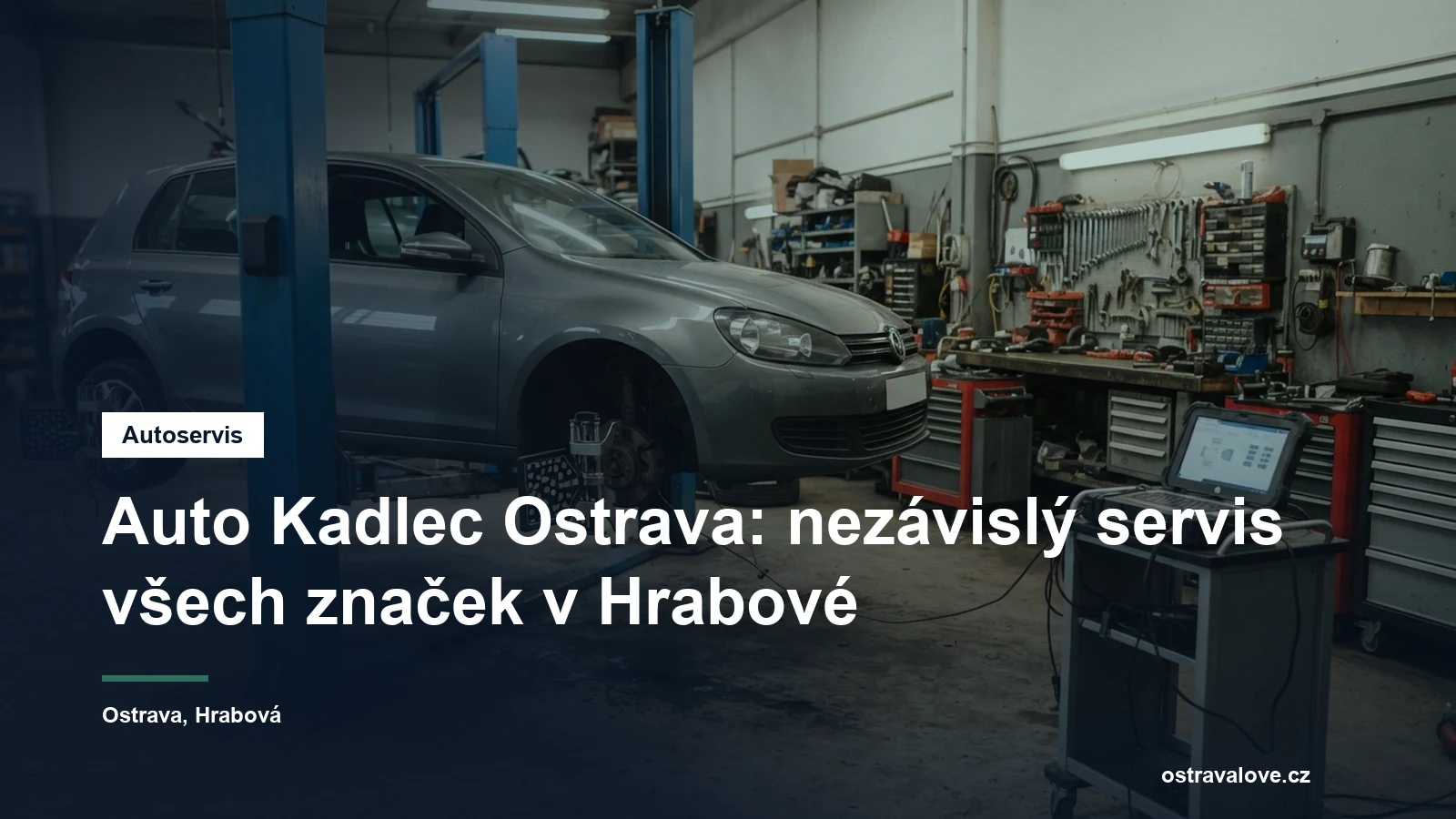 Dílna nezávislého autoservisu v Ostravě, osobní vůz na zvedáku a vedle něj pojízdný diagnostický přístroj