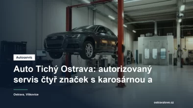 Servisní hala autorizovaného autoservisu v Ostravě, osobní vůz na zvedáku a vedle něj pracoviště karosárny s lakovacím boxem