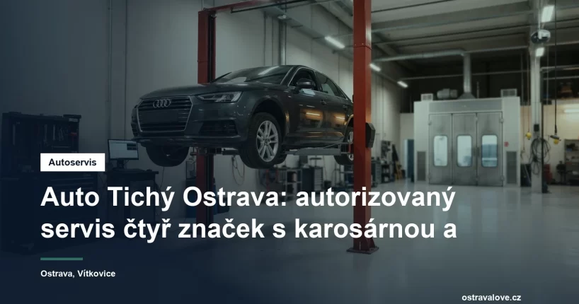 Servisní hala autorizovaného autoservisu v Ostravě, osobní vůz na zvedáku a vedle něj pracoviště karosárny s lakovacím boxem