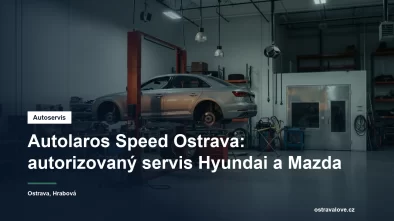 Servisní hala autorizovaného autoservisu v Ostravě, osobní vůz na zvedáku a vedle něj pracoviště karosářské dílny