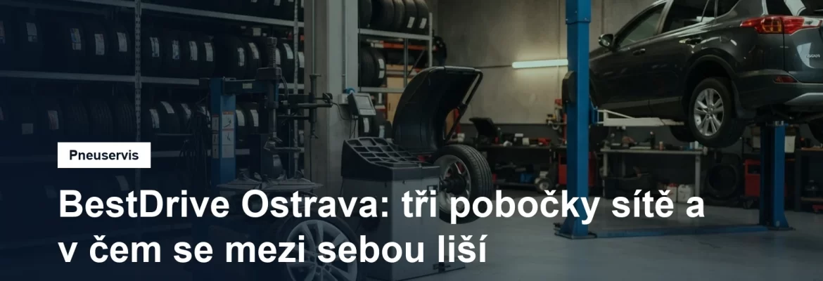 Pneuservisní hala v Ostravě, regál se sadami pneumatik a montážní stroj u zvedáku