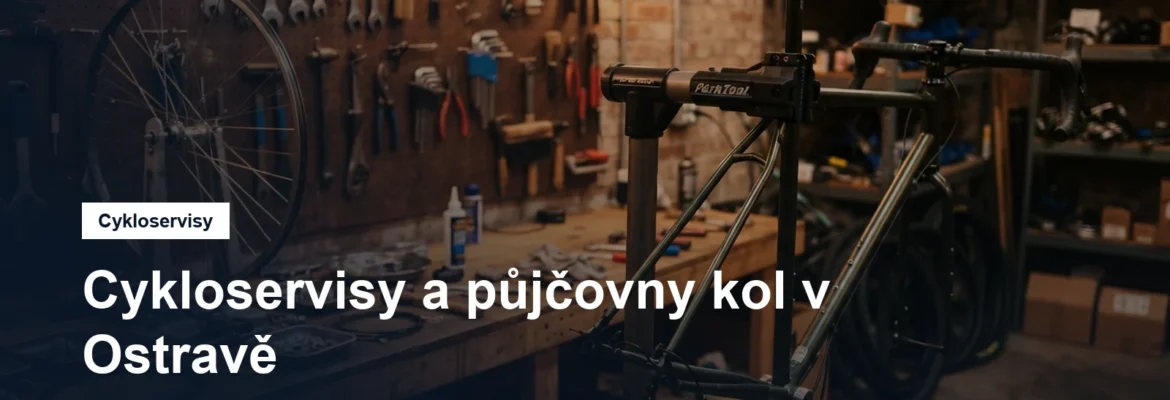 Cyklistická dílna s montážním stojanem a nářadím na stěně