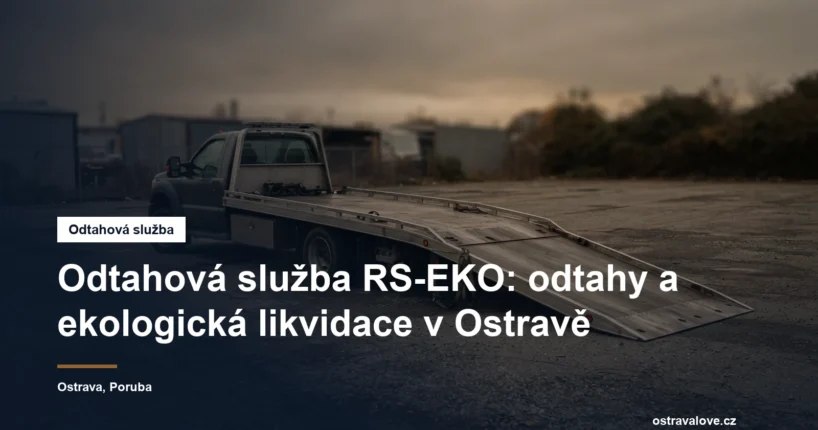 Odtahový vůz se sklopenou plošinou na asfaltové ploše