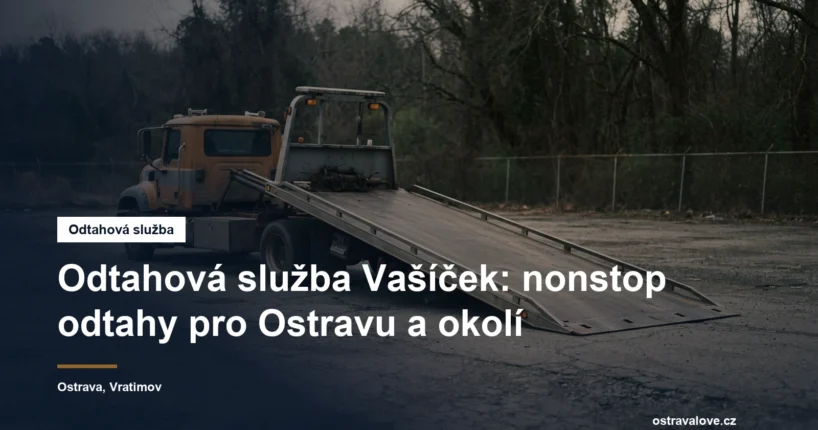 Odtahový vůz se sklopenou plošinou na asfaltové ploše