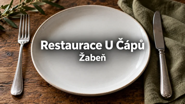 Bílý talíř s příborem a ubrouskem – Restaurace U Čápů, Žabeň