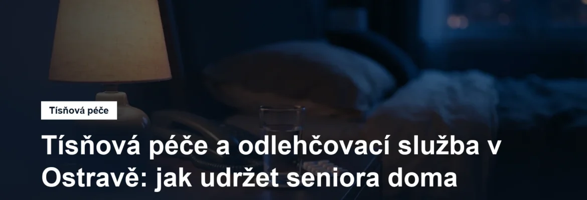 Noční stolek s lampičkou, telefonem a sklenicí vody