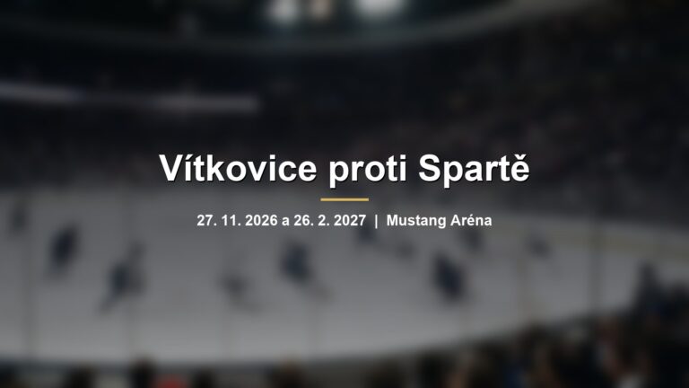 Rozmazaná hokejová aréna plná fanoušků s hráči na ledě s nápisem Vítkovice proti Spartě
